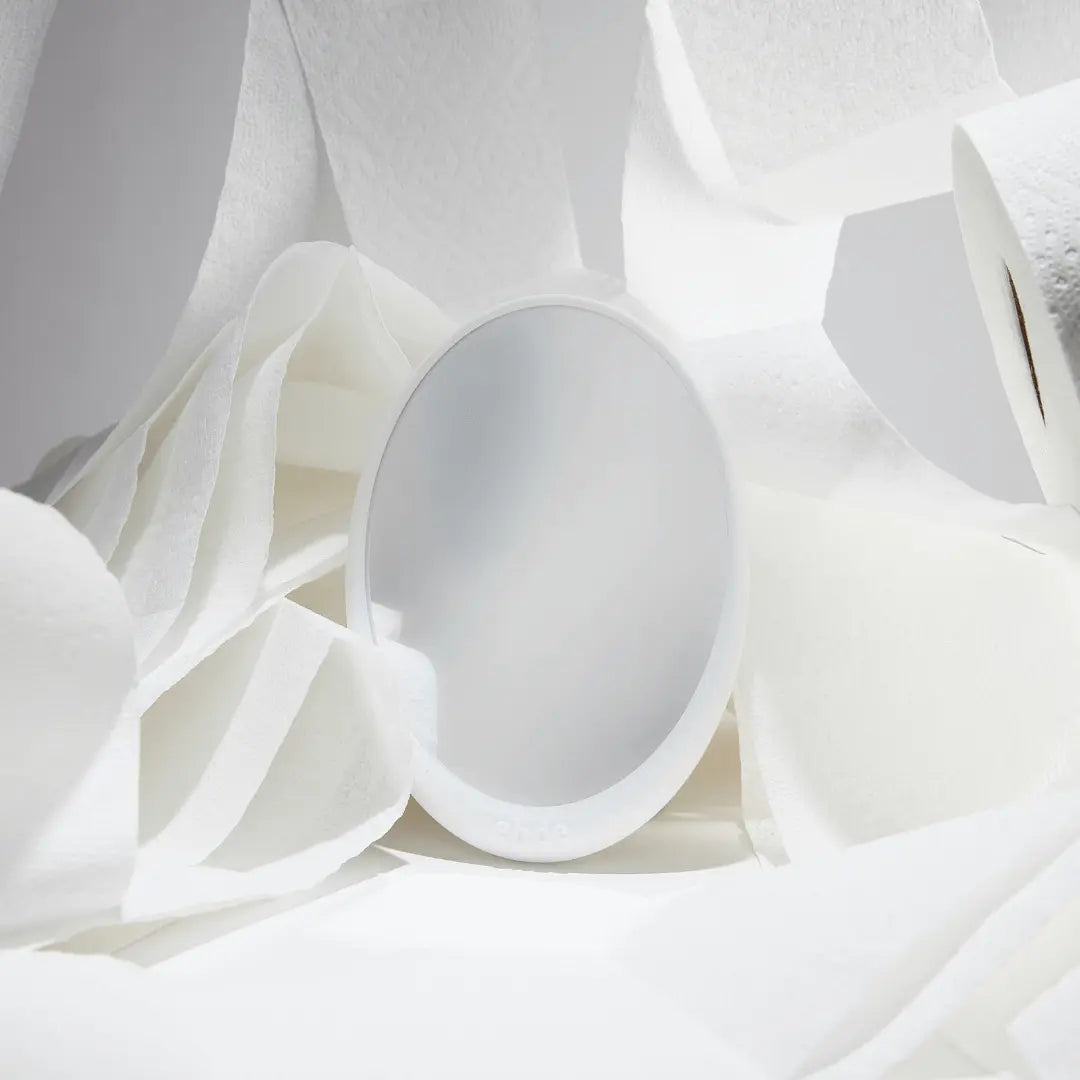 Ehde Toilet Mirror with toilet paper background - the perfect hygiene tool to ensure complete cleanliness.